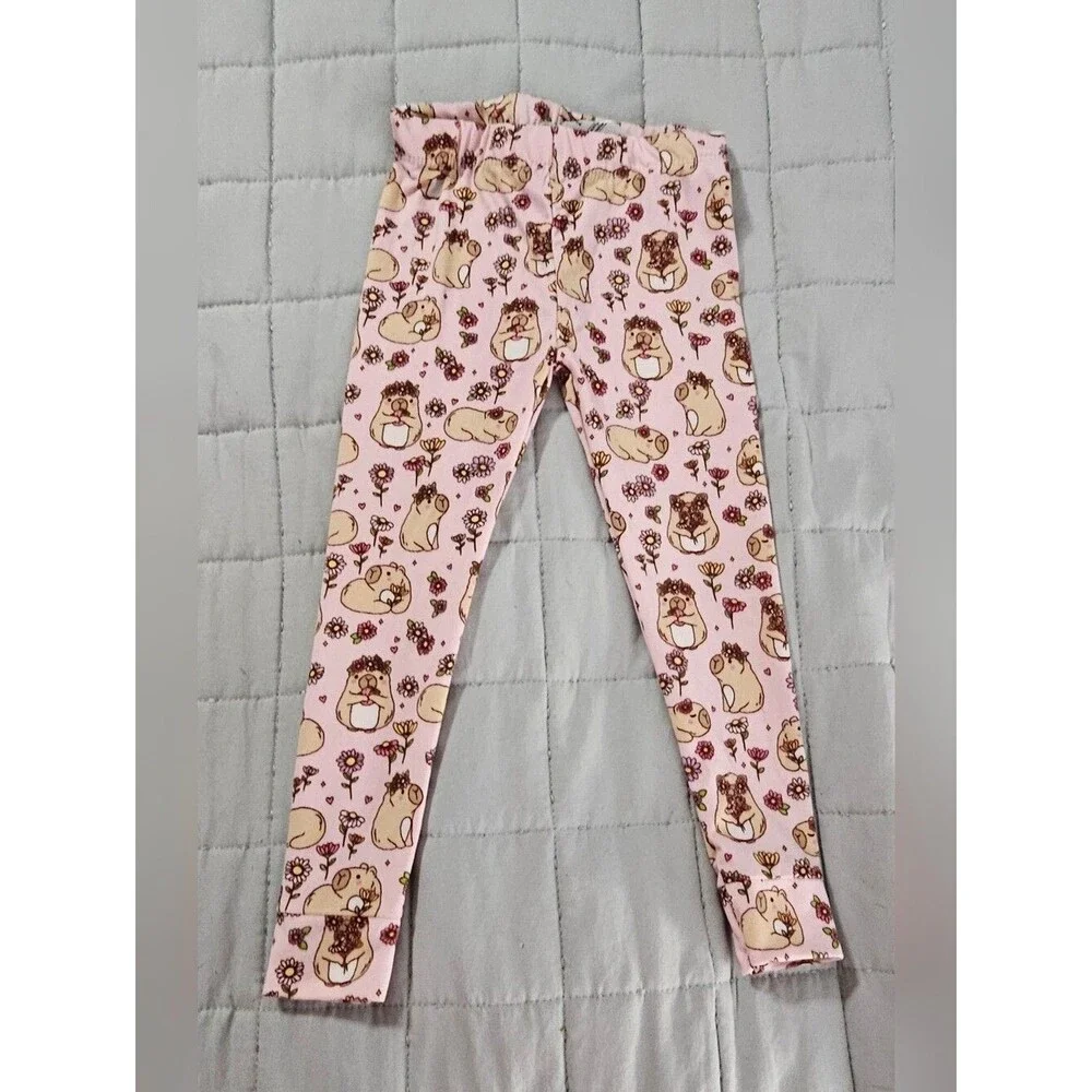 Penelope Mack,  pink capybaras and floral Pjs